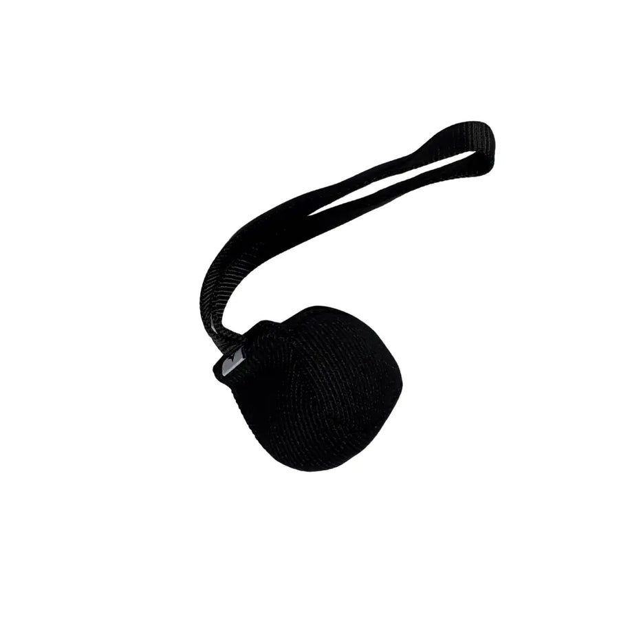 Black Nylcot Ball Tug with nylon webbing handle, RNRK9